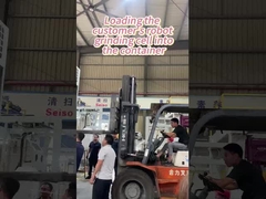 Chargement de la cellule de broyage robot du client dans le conteneur